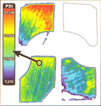 This pressure image of the progressive die reveals that three of the four bumper blocks experienced pressure of 7000 to 20,000 psi, while one block failed to make contact, requiring a shut-height correction.