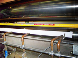 Pressurex® is placed on the roller at Mohawk Fine Papers before closing the nip.