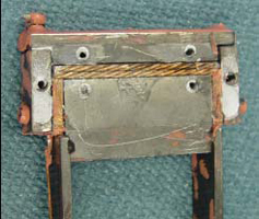 Figure 2. Left: Reaction/impregnation fixture closed before RTV sealing. Centre: After impregnation and removal of the side plates. Right: Assembly of several fixtures for multiple vacuum impregnations.