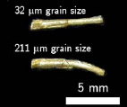 Fig. 1 Samples of pins extruded using the 0.76:0.57 mm die and work pieces having a grain size of 32 μm and 211 μm (modified from [2])